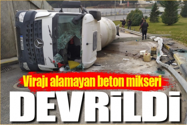 Virajı alamayan beton mikseri devrildi